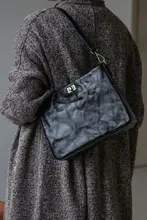真皮製ハンドグリップデザインのレトロショルダーバッグ【通勤・斜め掛け・女性用】