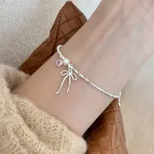 美しいリボンデザインのパールネックレス【鎖骨チェーン・春夏用・高級感あり】