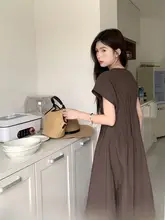 Vネックデザインの小飛袖ワンピース【夏用・個性的なリボンデザイン・ロング丈】