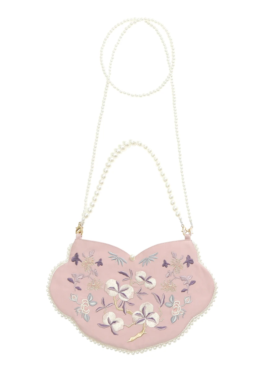 古風な刺繍小物入れ：伝統工芸品と現代デザインの融合を実現