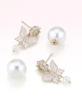 春の花と水をテーマにした水晶バタフライとパールのピアス【高級感あるデザイン】