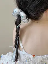 おしゃれな花モチーフの銀色ヘアゴム【水晶装飾・高級感・丸いまとめ髪用】