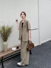 カーキ色のスタイリッシュなジャケットとパンツの2点セット【春秋用・ビジネスカジュアル】（セットアップ対応）