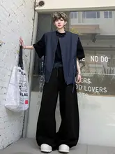 ストライプ柄の大きなサスペンダー付きベストとワイドレッグカジュアルパンツ（セットアップ対応）