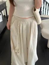 ボヘミアンスタイルの流れるフリンジ付きウエストストラップ