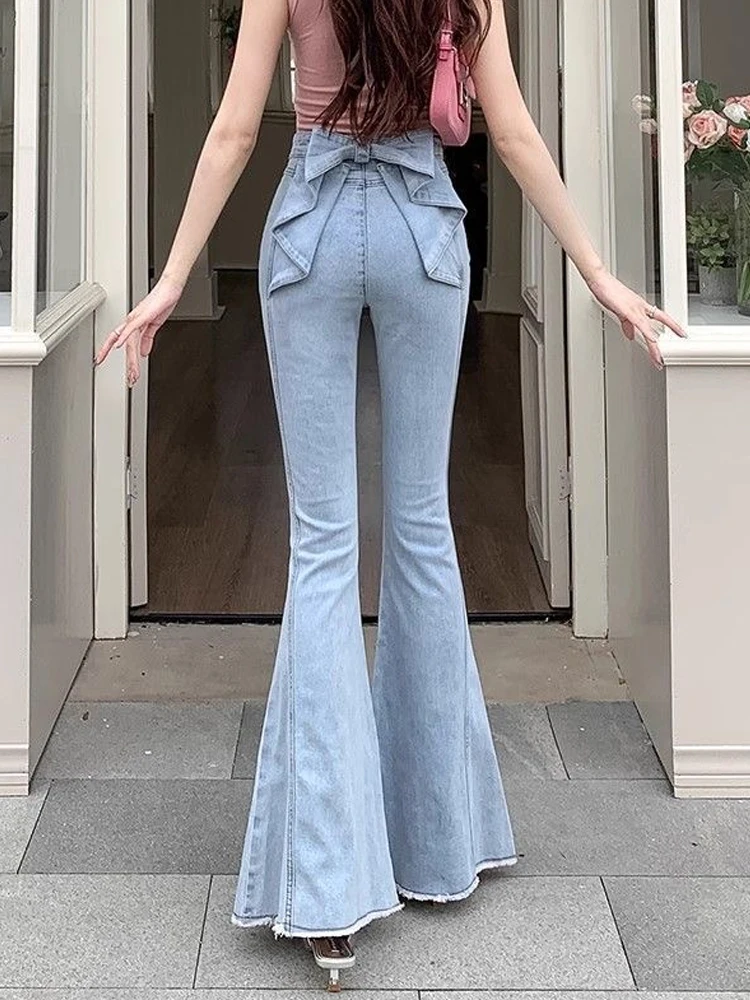 立体リボンデザインのハイウエストデニムパンツ【スリムフィット・フレアパンツ・包臀】