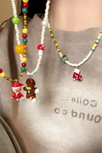 クリスマスツリーとジンジャーブレッドマンのネックレス【秋冬用・女性用・デコレーションデザイン】