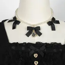 リボンデザインの水滴ペンダント【ABSパール使用・ロリィタスタイル・ラリエット】