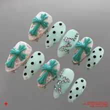 ハンドメイド浮彫り十字架デザインの夏用ネイル【薄荷色・星モチーフ】