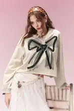 春にぴったり！リボン付きフードワイドパーカー【ポケットデザイン・ゆったりシルエット】