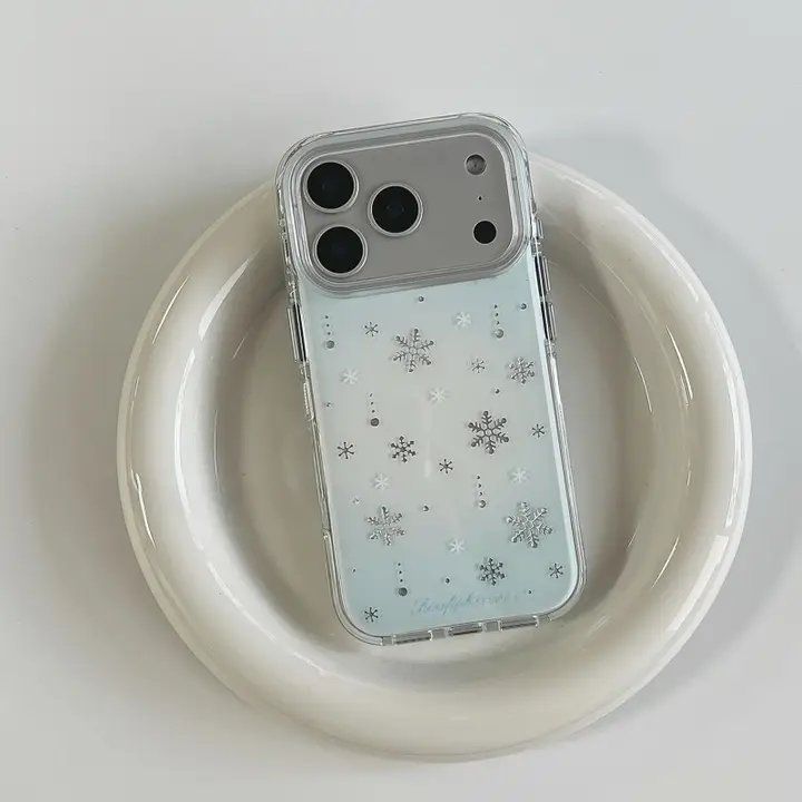 冬の雰囲気を感じるブルーとホワイトのグラデーションiPhoneケース【銀の雪花デザイン・衝撃吸収・Apple対応】
