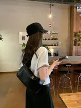 立体的なねじれ袖のTシャツ【柔光棉・フリルエッジ・夏用】