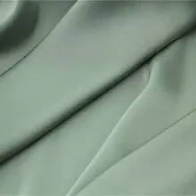 豆緑の麻サテン生地【微ストレッチ・光沢感あり・ドレス用】