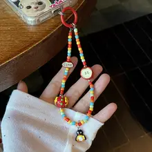 手描きリンゴデザインのビーズ携帯電話ストラップ【可愛いペンギンぬいぐるみ・赤色・防紛失用】