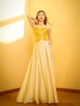 シャンパンゴールドのハイウエストAラインフレアスカート【シンプルデザイン・ミディ丈・甘美なシルエット】
