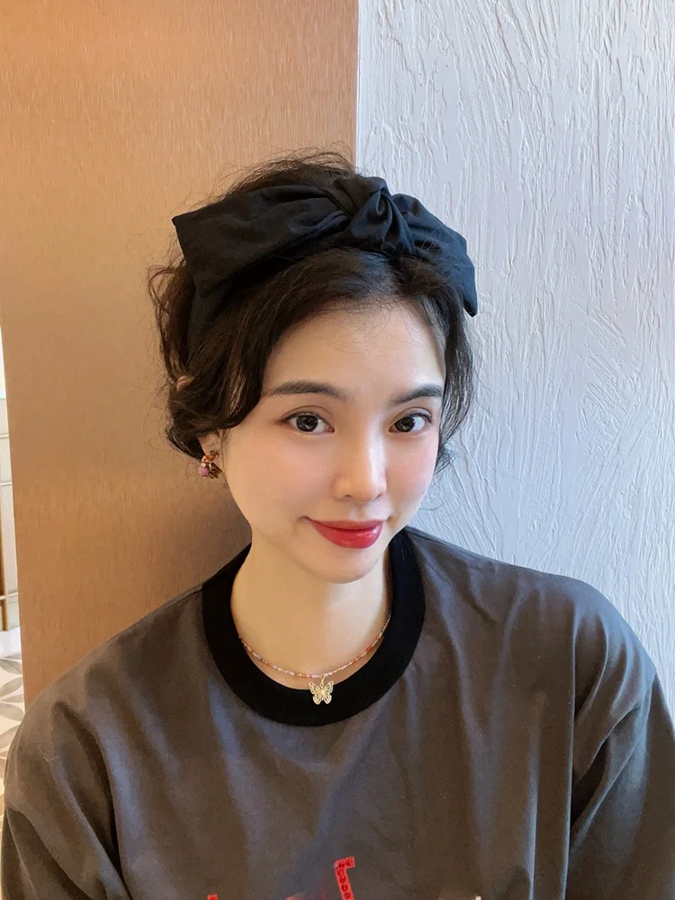 お宮参り ヘアバンド おすすめ：ブラックリボンヘアバンド【布素材・韓国風・小顔効果】