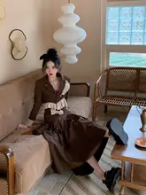 [WALKINDARK] 不規則な切り替えデザインのショートジャケットとボタン付きプリーツロングスカートのセット