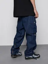 カジュアルな多ポケットデザインのデニムパンツ【ルーズフィット・束脚・ハイストリートスタイル】（セットアップ対応）