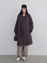 秋のシンプルなレトロAラインシルエットの隠しボタン付きトレンチコート