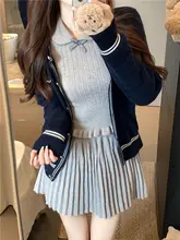 グレーの風信子 プリーツスカートとニットトップス【ピータ ーパンカラー・リボン付き・ウエスト収縮】（セットアップ対応）