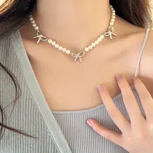 気品あるデザイン！パール付きリボンネックレス【シルバー・鎖骨チェーン】