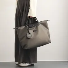大容量のトラベルバッグ【牛津布・女性用・ハンドル付き・出張用】
