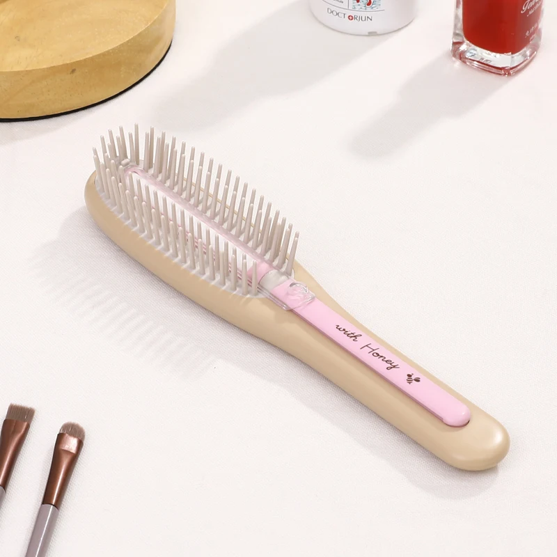 蜂蜜成分のダメージケアマッサージヘアブラシ：頭皮に優しいスカルプブラシの実用性と効果