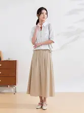 スタイリッシュな通勤向けトップス【韓国風・フェイクツーピースデザイン・スリム効果】（セットアップ対応）