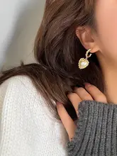 ハート型パールイヤリング【フレンチスタイル・レトロデザイン・メタルテクスチャ・優雅な雰囲気】
（セットアップ対応）