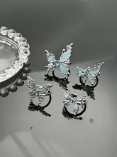 ブルー液体蝶モチーフリング【個性的なデザイン・大ぶり・不規則型】