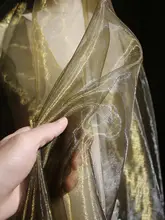 透け感のある金色のオーガンザ生地【華やかなウェディングドレス・和服・子供服デザインに最適】