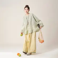 グリーンドット柄刺繍ブラウス【透かしデザイン・フリル裾】