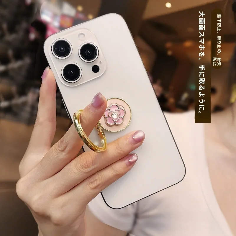 水晶デザインのスマホリングスタンド：粘貼式で安定した動画視聴に最適な置き型ホルダー