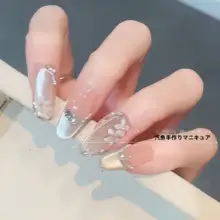 初春の白いキャットアイネイル【清涼感・ハンドメイド・華やかさ】