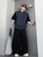 ストライプ柄の大きなサスペンダー付きベストとワイドレッグカジュアルパンツ（セットアップ対応）