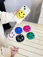 充填された笑顔デザインのマグネット式スマホスタンド【吸着式・伸縮・回転対応】