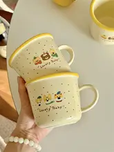 かわいいカラフルドットデザインの陶器製マグカップ【ミルクイエロー・アニメイラスト】