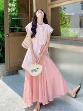 かわいいピンクの水玉トップスとカジュアルなスカート【夏のスタイル・二点セットアップ対応】