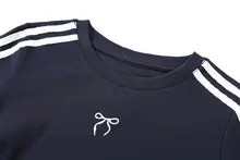 リボン付きTシャツとAラインスカートの夏用カジュアルコーディネート（セットアップ対応）