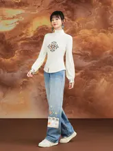 民族風刺繍が施された冬用フリース入りストレートデニムパンツ