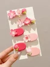 優しいピンク色のポンポンヘアクリップ【サイドクリップ・少女向け・前髪用】