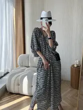 個性的なデザイン！Vネックバックオープンランタンスリーブロングドレス【した雰囲気・フラワープリント】