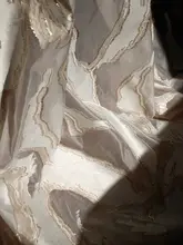 不規則デザインの透け感のある生地【箔金加工・創作ドレス用】