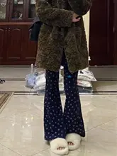 デザイン性のあるブルーの笑顔プリントフレアパンツ【細身・カジュアル・アクティブ対応】
