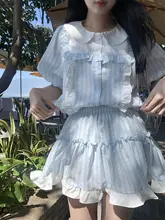 春季用ストライプデザイン ガーリースタイル ブラウス＆スカート【ラッフルヘム・フィット・女性用】（セットアップ対応）