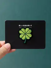 布製刺繍の四葉クローバー ブローチ【衣類や帽子の飾りに】