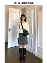 優雅なデザインのアプリコットカラーセーター【半高ネック・ニット・秋冬用】
