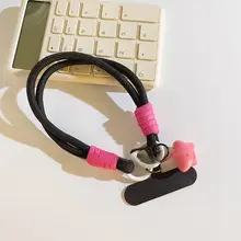 可愛いカートゥーンデザインの星型モバイルケース用チャーム【極上の柔らかさ・黒い手首ベルト・短編み込み・多機能キーリング・カメラアクセサリー・女性向け】
