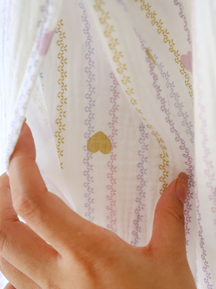 母乳アクセサリーとしての胸パッド付き授乳トップス：デザインと機能の実証分析