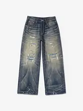ウォッシュド・泥染め加工のデニムパンツ【破れ補修・アシンメトリーデザイン・ワイドストレート】（セットアップ対応）